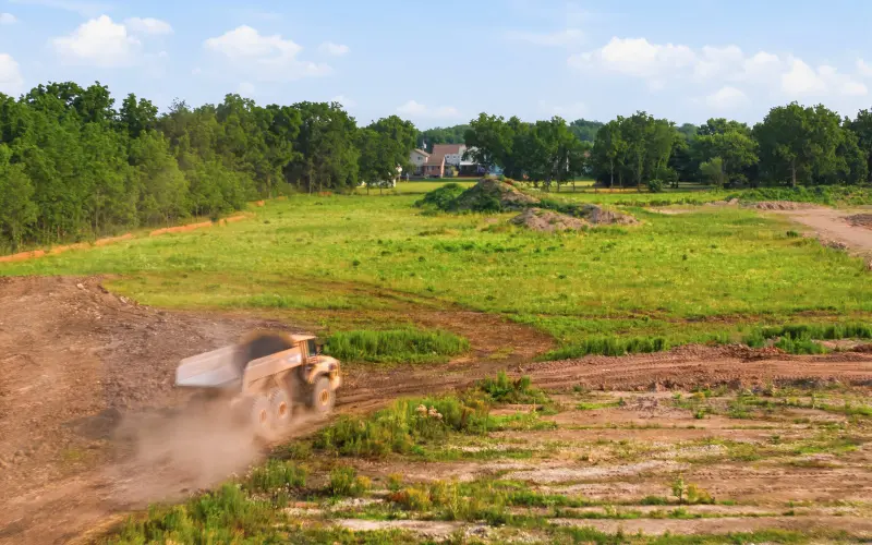 A truck moving across the prepared South Coast site on July 23, 2026