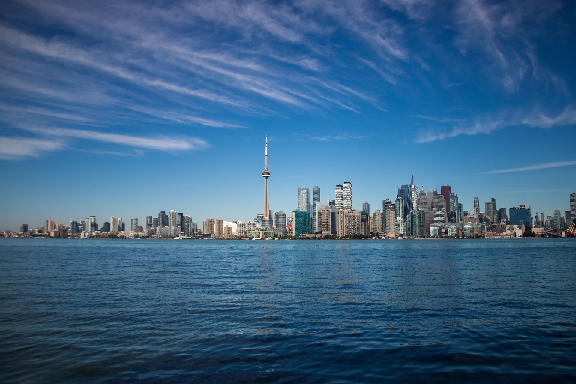 Downtown Toronto skyline and CN Tower viewed across the water.